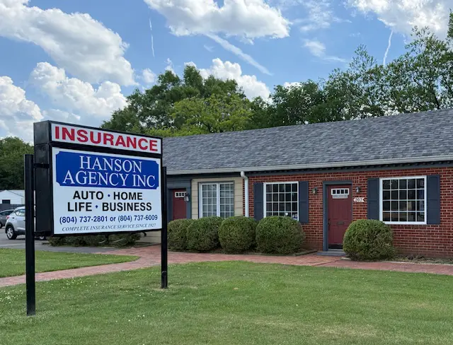 A sign in front of a building that says " hanson agency inc."